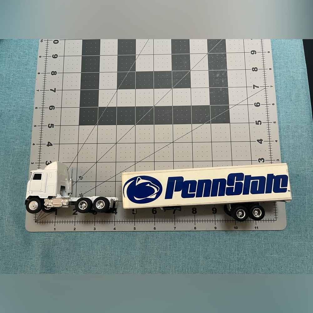 White and Blue Toy Truck with Trailer